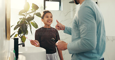 Buy stock photo Child, father and brushing teeth with thumbs up in bathroom for fresh breath, oral hygiene and teaching. Family, girl and man for dental health, cleaning mouth and learning to remove plaque in house