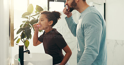 Buy stock photo Happy child, dad and brushing teeth in bathroom for dental hygiene or morning routine in home. Father, daughter and toothbrush with mirror or lens flare for clean mouth, fresh breath or oral care