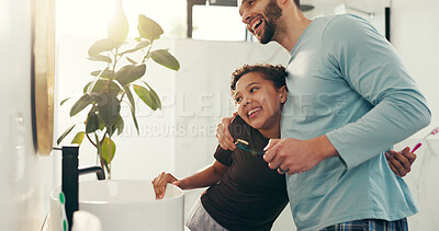 Buy stock photo Child, father and brushing teeth with hug in bathroom for fresh breath, oral hygiene and bonding. Family, girl and man for dental health routine, cleaning mouth and support to remove plaque in house