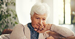 Thinking, memory and senior woman on sofa in home for relaxing, reflection or nostalgia in living room. Ideas, retirement and elderly female person with choice, planning or decision in house.