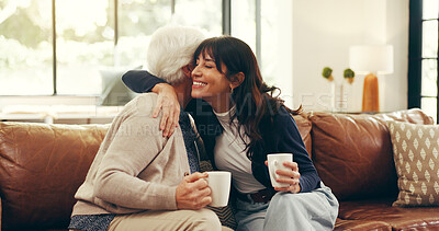 Buy stock photo Relax, coffee and hug with senior mother and daughter on sofa for love, bonding or support. Retirement, care and drinking tea with women in living room of family home for trust, connection or embrace