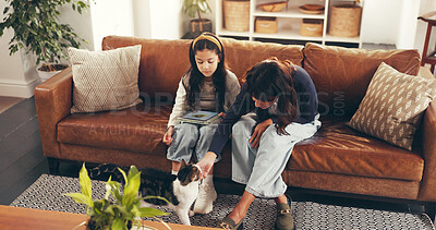 Buy stock photo Break, cat or stroke with mother and daughter on sofa in living room of home together for bonding. Animal care, chill or relax with girl child, pet and single parent woman in apartment on weekend