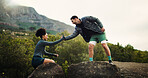 Couple, helping hand and rock climb with mountain for hiking trail, exercise or outdoor fitness. Man, woman or assistance with lift on cliff for trekking journey or adventure together in nature