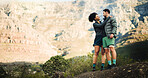 Happy, couple and hiking with hug on mountain for view, travel adventure and bonding on holiday. Smile, people and embrace for sightseeing together, trekking trip and backpacking vacation in nature