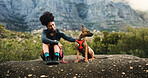 Woman, relax and hiking with dog on mountain for travel, morning exercise and trekking break. Happy, female person and rock with pet companion, tourism adventure and fresh air for vacation bonding