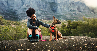 Buy stock photo Woman, relax and hiking with dog on mountain for travel, morning exercise and trekking break. Happy, female person and rock with pet companion, tourism adventure and fresh air for vacation bonding