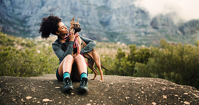 Buy stock photo Break, hiking or love with woman and dog in mountains for adventure, bonding or journey. Cuddle, relax or trekking with happy pet owner and puppy on space in forest together for exercise or fitness