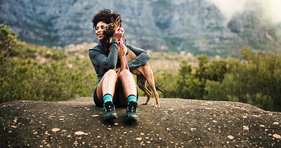 Buy stock photo Break, cuddle or hiking with woman and dog in mountains for adventure, bonding or journey. Love, relax or trekking with happy pet owner and puppy outdoor in forest together for exercise or fitness