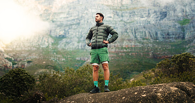 Buy stock photo Hiking, thinking and man in nature for travel, adventure and exploration on mountain on holiday. Vacation, trekking and person with reflection outdoor, sightseeing and vision for tourism with space