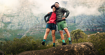 Buy stock photo Hug, mountain and hiking with couple in nature for fitness, trekking adventure and support. Workout partner, hiker date and bonding with man and woman on rock for health, vacation and connection