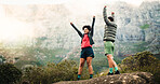 Happy couple, fist pump and mountain with success on rock for workout achievement or conquer. Active, man and woman with smile in celebration for hiking accomplishment or trekking milestone in nature