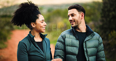Buy stock photo Smile, travel and hiking with couple in nature for fitness, trekking adventure and love. Workout partner, hiker date and bonding with man and woman on path for health, vacation and connection