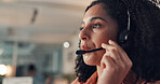 Business woman, agent or night with headset for online advice or customer service in office. Female person, consultant or working late with mic for virtual assistance or help in call center workplace