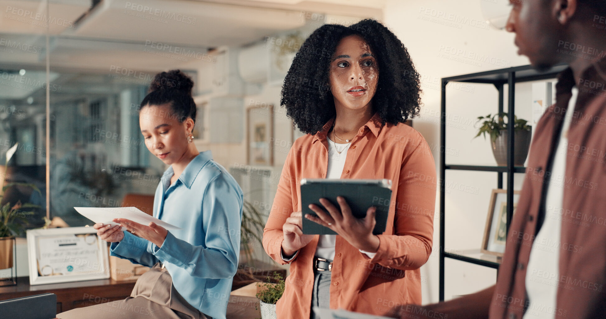 Buy stock photo Night, brainstorming and people in office with tablet, strategy and collaboration for app development. Planning, teamwork and overtime in business with tech, online research or discussion for startup