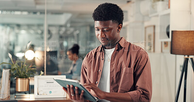 Buy stock photo Business man, reading or research with tablet in office, info or analysis for marketing campaign. Night, review or employee with tech to check online traffic or multimedia project at creative startup