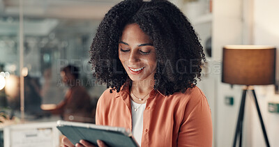 Buy stock photo Business woman, reading or research with tablet in office, info or analysis for social media marketing. Night, review or person with tech for online traffic or multimedia project at creative startup