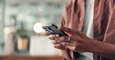 Buy stock photo Cellphone, hands and man in office with networking, communication or contact on mobile app. Typing, technology and African male creative director with chatting online with phone in workplace.