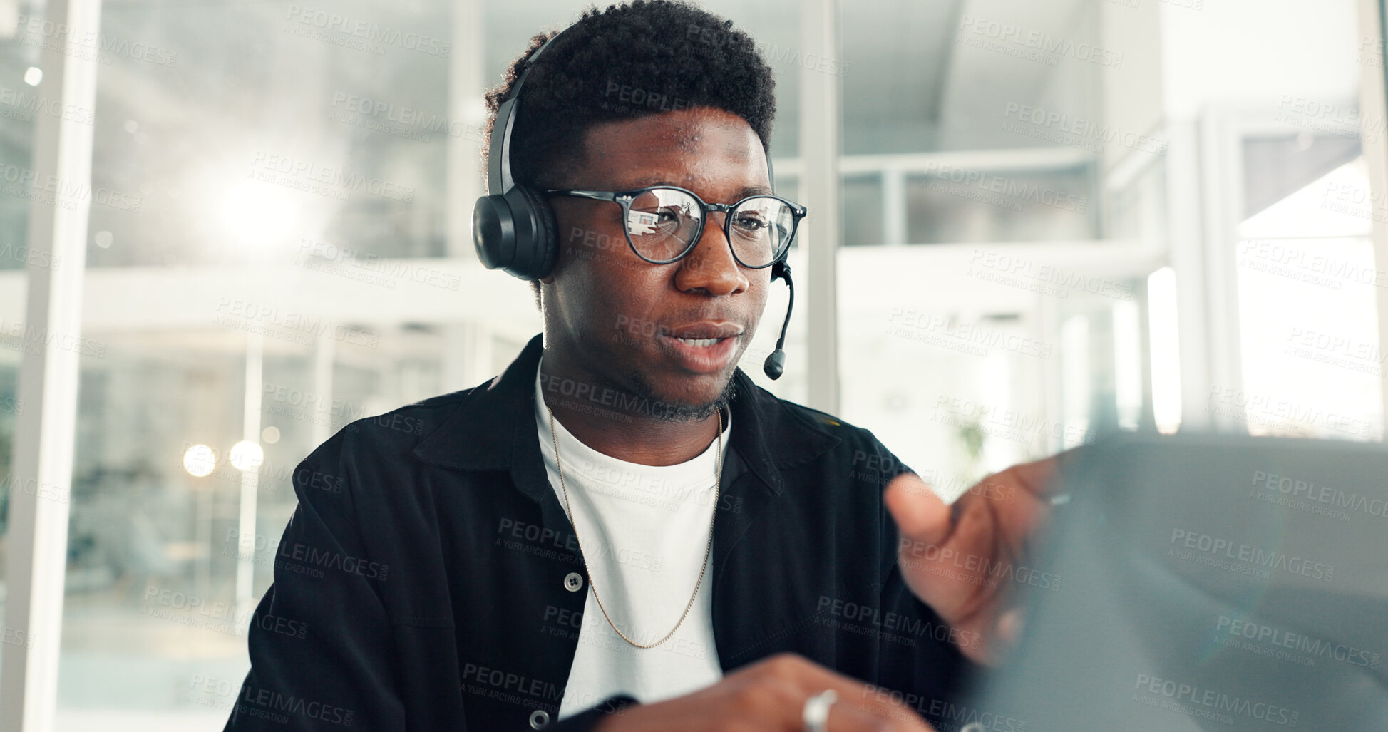 Buy stock photo Customer service, call center and black man with headset in office for advice, online help and consulting. Communication, business and person talking for contact, crm support and virtual assistance