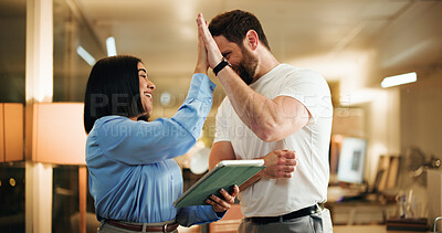 Buy stock photo Night, woman and man in office with high five, success and collaboration in digital app launch. Business, celebration and people in workplace with technology, teamwork and working late in company