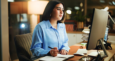 Buy stock photo Writing, notes and businesswoman in office at night with research for finance report with deadline. Computer, reading and female financial manager with investment proposal for overtime in workplace.
