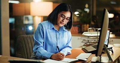 Buy stock photo Night, woman and writing in office with laptop, corporate and audit for financial report. Happy, accountant and glasses in company with computer, smile and productivity for business regulations. 