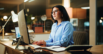 Buy stock photo Night, reading and business woman with computer for stock market analysis, chart or financial review. Desktop, deadline or serious broker in office for trading, investment forecast or portfolio stats