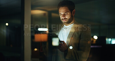 Buy stock photo Night, tablet and serious with business man in office for online planning, research or schedule. App, development and glass with professional employee in corporate workplace for agenda or review