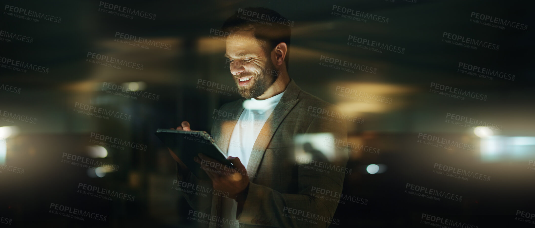 Buy stock photo Night, smile and tablet with business man in office for development, research or schedule. App, glass and online planning with happy employee in professional workplace for agenda, report or review