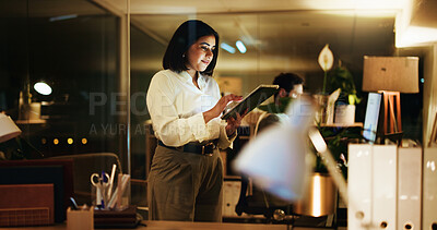 Buy stock photo Business woman, tablet and night for reading in office, financial portfolio update or scroll trader info online. Trading, broker and tech for investment report, stock market research and deadline