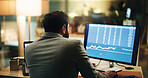 Graphs, back and business man with computer screen for stock market analysis, finance data and night. Monitor, deadline and broker in office for trading, investment growth and risk assessment