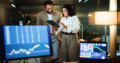 Buy stock photo Happy, business people and night with tablet or stock market team for virtual exchange in office. Businessman, woman or broker with technology display, graph or chart for data, statistics or trading