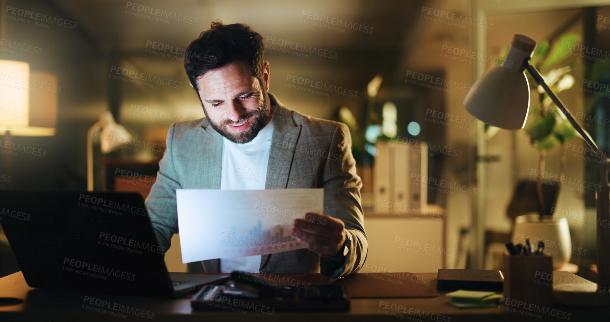 Buy stock photo Laptop, reading and documents with business man in office for night, account graph and research. Budget report, audit deadline and paperwork with person in agency for review, chart and overtime