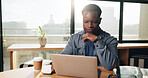 Laptop, research and businessman in office for creative project at startup company. Technology, email and African male magazine editor with computer for online article with publishing in workplace.