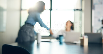 Buy stock photo Handshake, meeting and blur of business people in office for teamwork, discussion and project planning. Startup, finance advisor and women shaking hands for collaboration, partnership and consulting