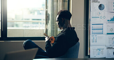 Buy stock photo Phone, business and black man in office for financial forecast, company expenditure and graphs. Mobile, analyst and reading email for data analysis, investment trends or review chart for kpi online