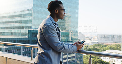 Buy stock photo Business, balcony and black man with smartphone, thinking and message to contact, email and urban town. African person, outdoor and employee with view, cellphone and decision with social media or app
