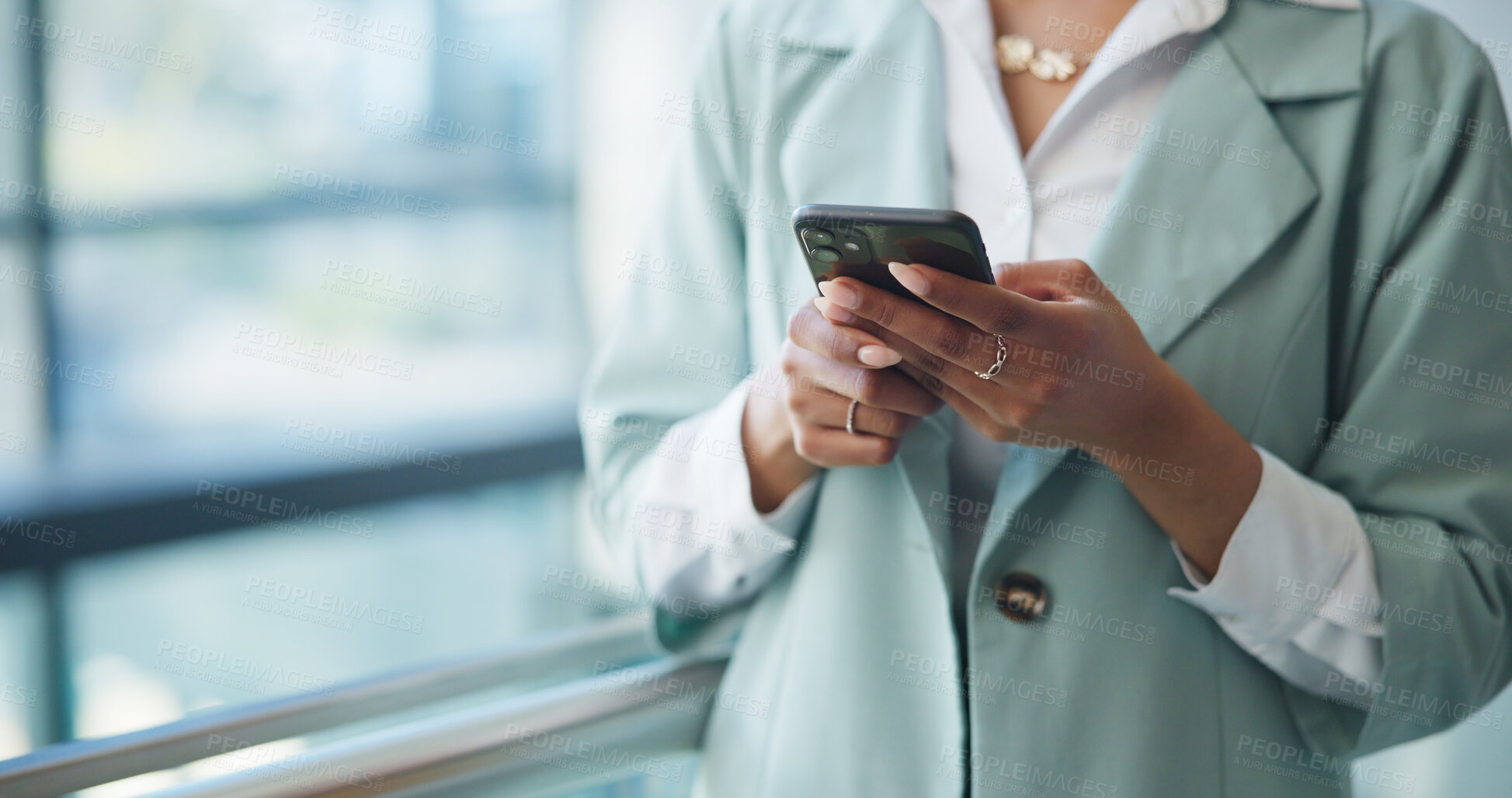 Buy stock photo Employee, hands and texting with smartphone, office and property listing on social media or website. Balcony, message and person with tech for communication, space and real estate agent with mobile