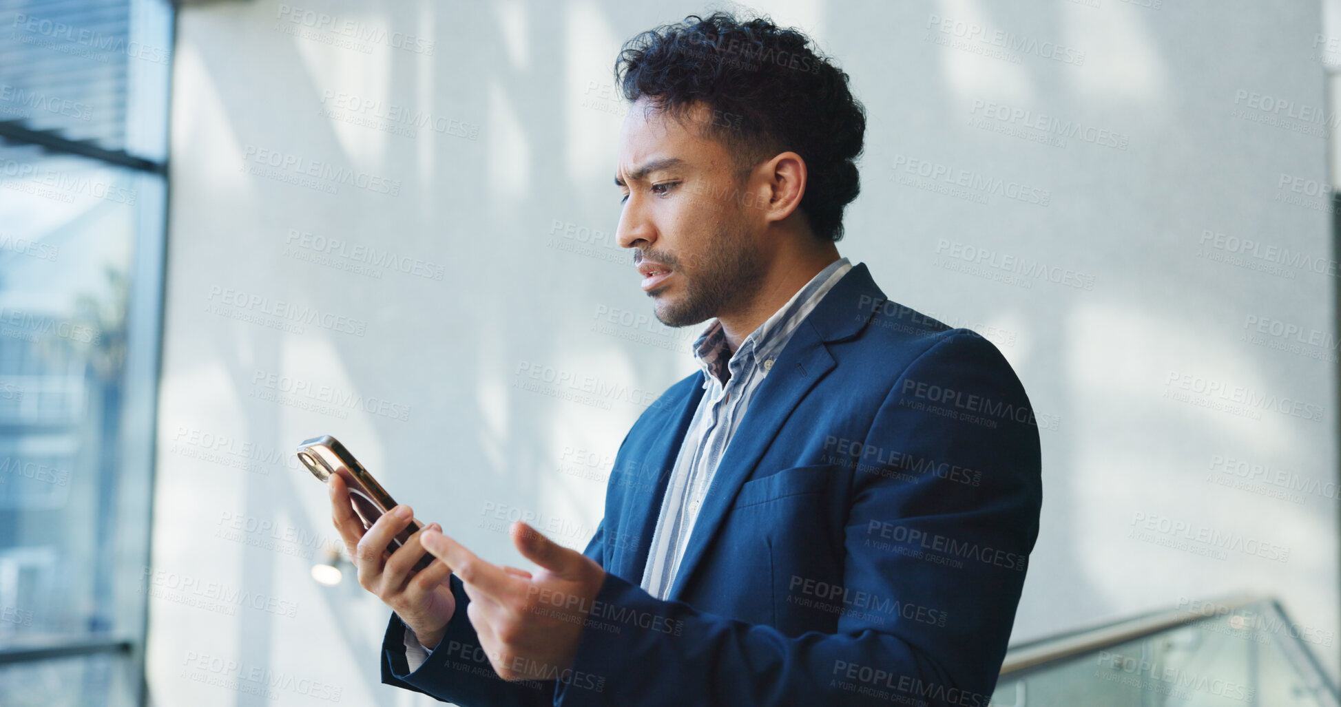 Buy stock photo Phone, upset and businessman in office with networking, communication and contact on mobile app. Research, technology and corporate employee with cellphone for email, chatting or texting in workplace