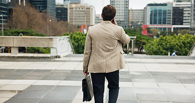 Buy stock photo City, commute and phone call with business man from back for travel to job or work location. Buildings, communication and walking with employee person outdoor in urban town for trip to destination