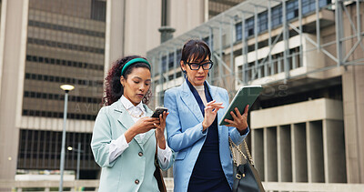 Buy stock photo Business women, tablet and walking with personal assistant for schedule or appointments in city. People, boss and planner with technology for notes, agenda or tasks with conversation in New York