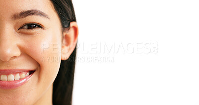 Buy stock photo Half face, skincare and smile with woman in studio for beauty, self care and collagen benefits. Dermatology, glow and portrait with female person on white background for mockup space, shine and pride