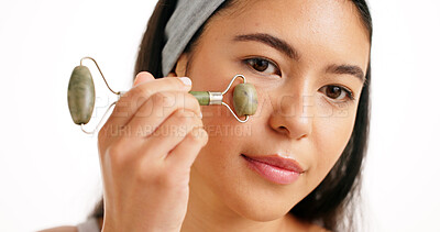 Buy stock photo Woman, face or massage with jade roller for anti aging skincare on a white studio background. Female person, model or portrait with beauty tool for facial treatment, lymphatic drainage or circulation