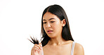 Woman, concern and hair with damage in studio for split ends or dry on a white background. Female person, model or worry with beauty stress for haircare treatment, repair or tips on mockup space