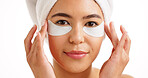 Woman, portrait and skincare with eye patches in studio for collagen on a white background. Face, female person or model with hydrogel mask or facial detox for anti aging, vitamin C or hydration