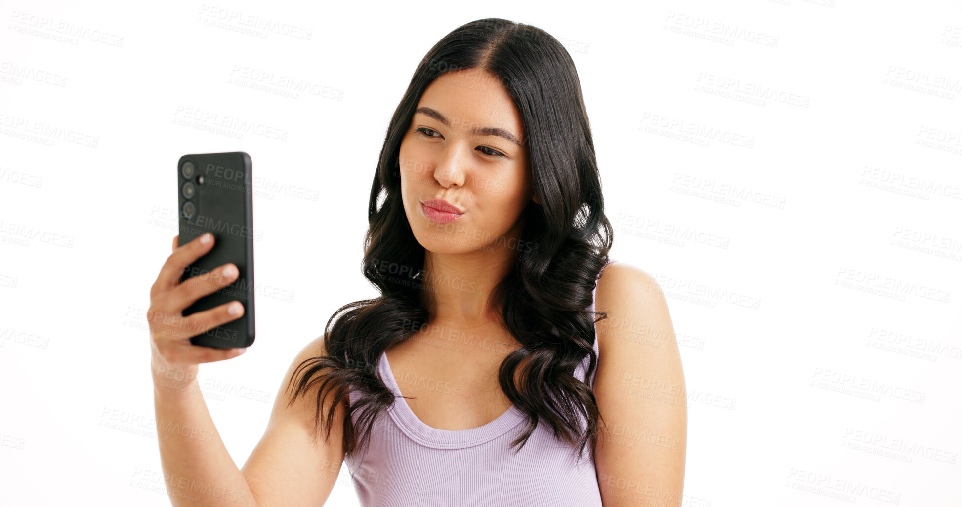 Buy stock photo Woman, selfie and kiss in studio for hair care, salon review or social media platform. Girl, smile or photography on white background with hairstyle, beauty blog update or pout with confident space