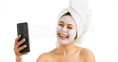 Buy stock photo Facial, selfie and skincare with woman in studio for beauty treatment, social media and clay mask. Detox cosmetics, spa influencer and dermatology with person and picture on white background for glow