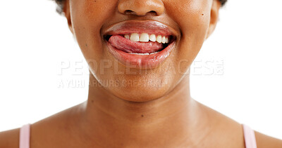 Buy stock photo Lick, dental care and black woman with a smile in studio for oral hygiene, wellness and plaque. Cleaning, closeup and female person with healthy teeth, grooming and happy on white background