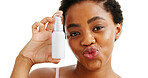 Black woman, skincare spray and studio portrait with pout, funny face and confidence on white background. African model, girl and lips with product for dermatology, beauty and cosmetics in Kenya