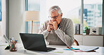 Laptop, stress and thinking with business man in office for accounting, finance or tax review. Computer, problem solving and reading with mature accountant in financial workplace for risk management