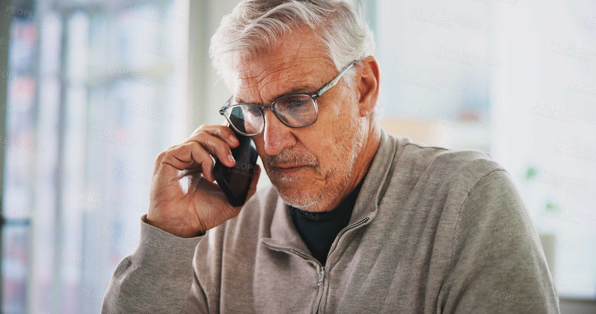 Buy stock photo Office, phone call and mature business man listening for publishing deal, serious news or info. Mobile, editor in chief and talking to contact in workplace for story feedback, creative and networking